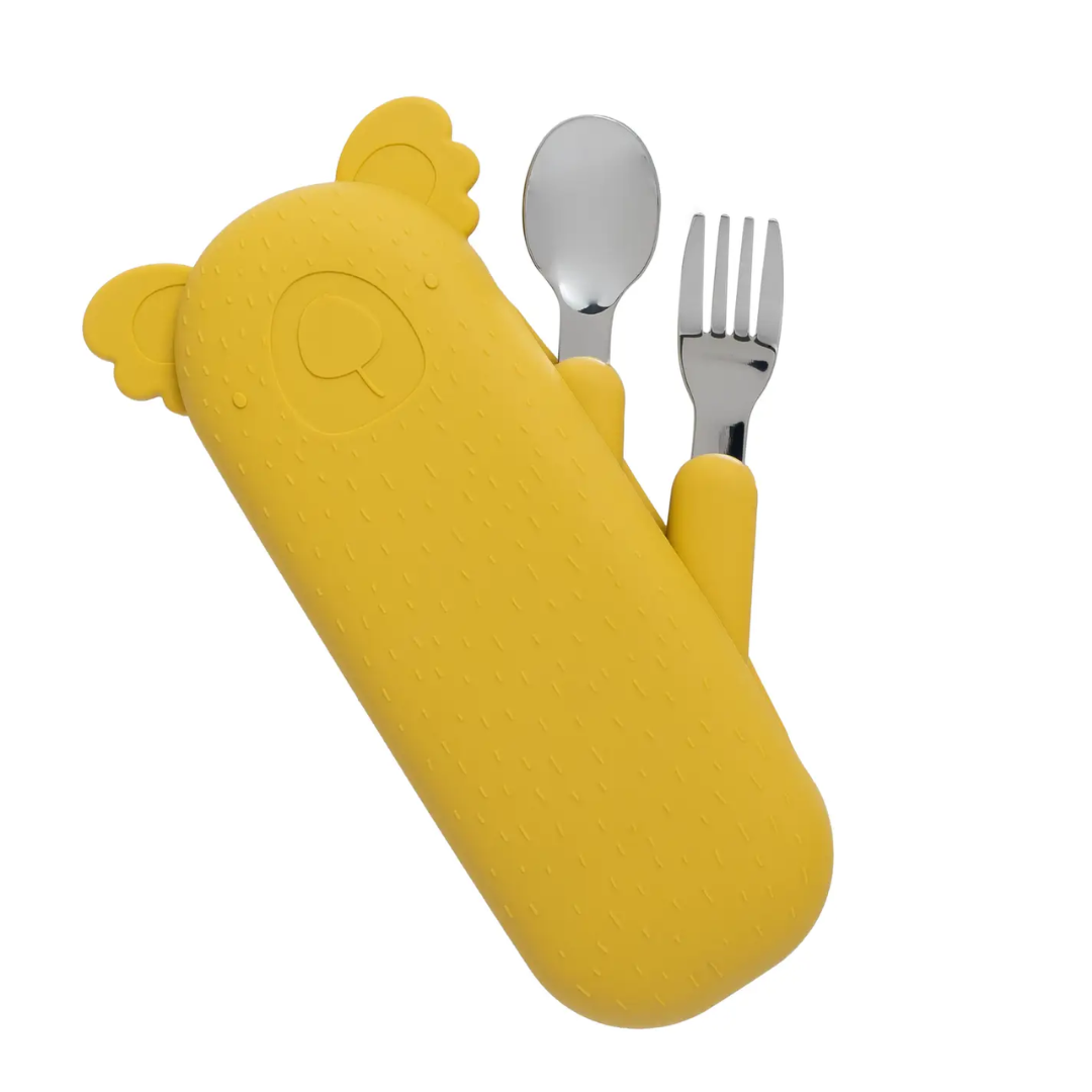 Bestickset i gul färg med silikonfodral för barn